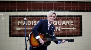 Brandi Carlile in front of the Madison Square Garden sign