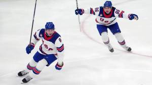 Jack Hughes celebrates overtime goal at Winter Olympics