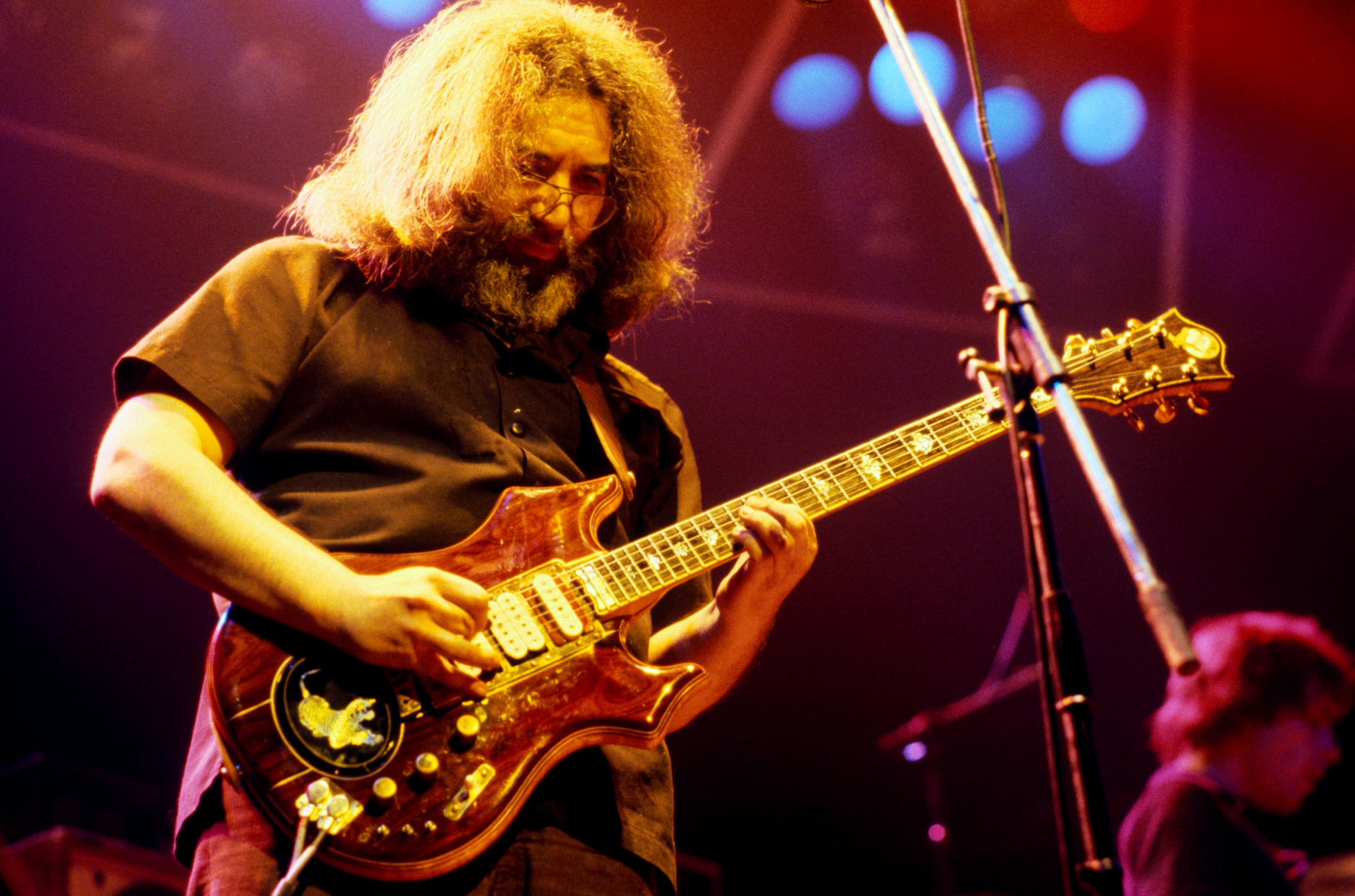 Jerry Garcia of The Grateful Dead performs on stage, circa 1981. (Photo by Michael Putland/Getty Images)