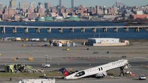 Air-Canada-Express-on-the-runway-after-colliding-with-Port-Authority-fire-truck-at-LaGuardia-Airport