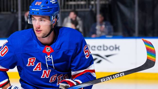 Rangers forward Will Cuyle with Pride Night tape