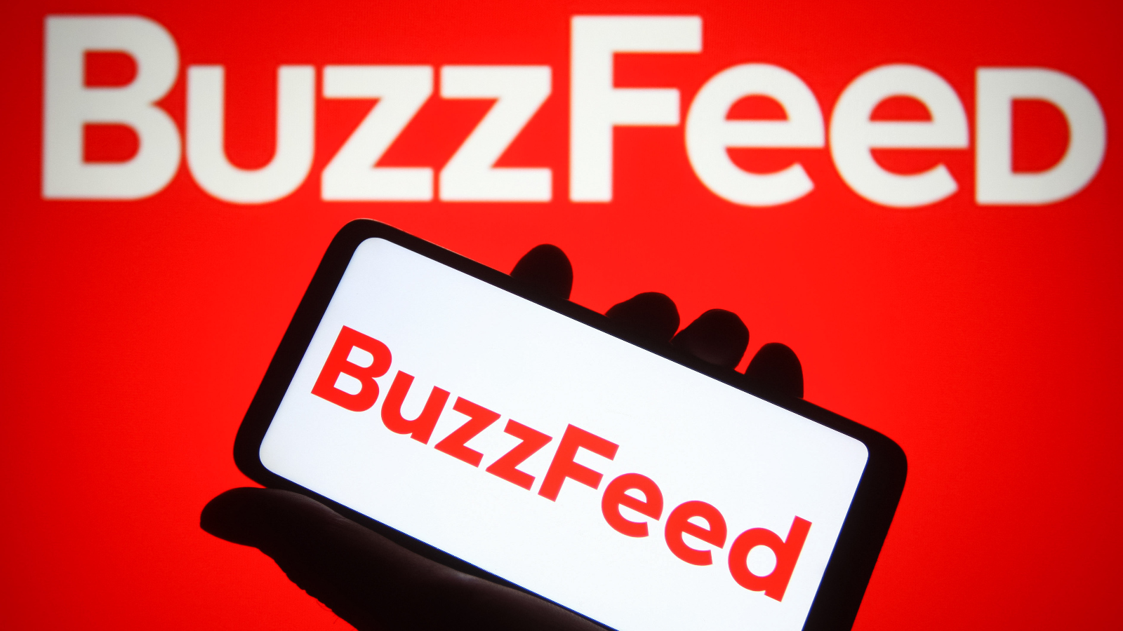 buzzfeed logo on a sign