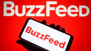 buzzfeed logo on a sign