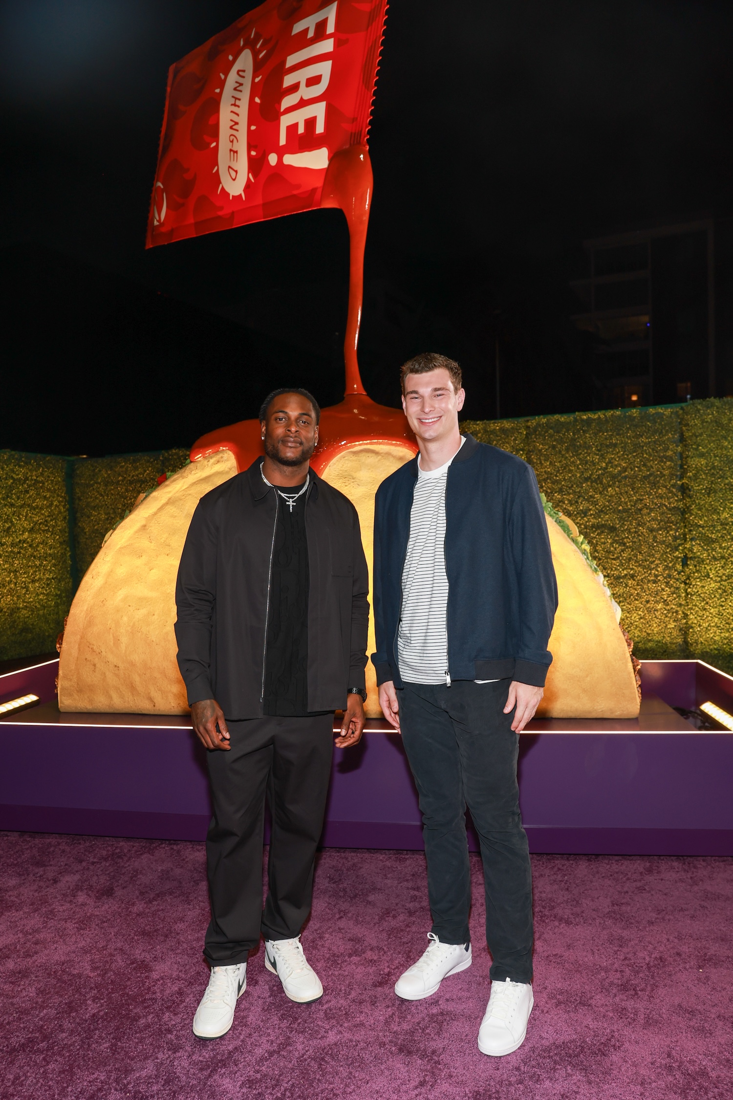 LOS ANGELES, CALIFORNIA - MARCH 03: Davante Adams and Fernando Mendoza attend Live Más LIVE 2026 at Hollywood Palladium on March 03, 2026 in Los Angeles, California.