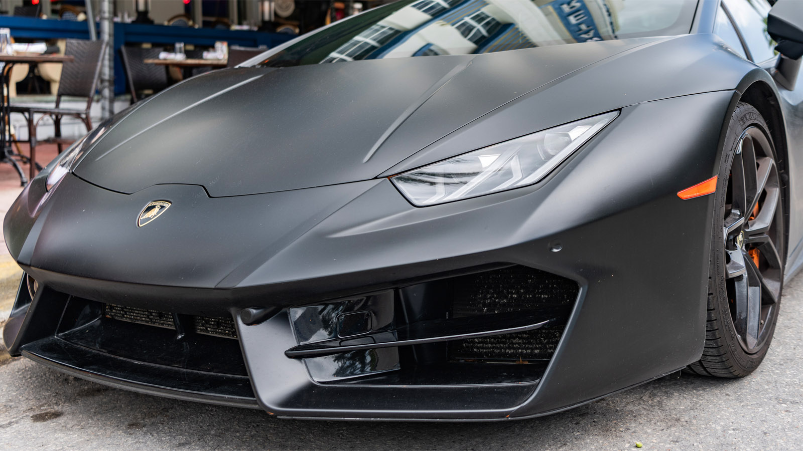 Florida Woman Accidentally Drives Her Giant Lifted Truck Onto A Lamborghini, Crushing It With Driver Inside