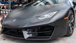 Florida Woman Accidentally Drives Her Giant Lifted Truck Onto A Lamborghini, Crushing It With Driver Inside