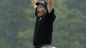 Phil Mickelson celebrates after winning The Masters in 2004