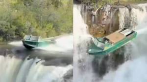 Boat driving off Lundbreck Falls in Alberta, Canada