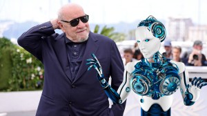director Paul Schrader next to an AI girlfriend robot