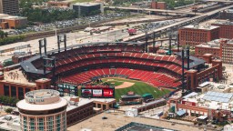Cardinals Fan Sits Dangerously On Upper Deck Ledge, Resists Fans Who Pull Him To Safety
