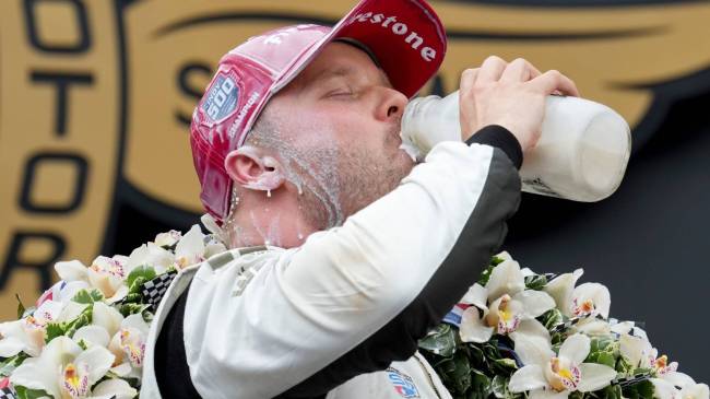 Felix Rosenqvist drinks milk after winning Indianapolis 500