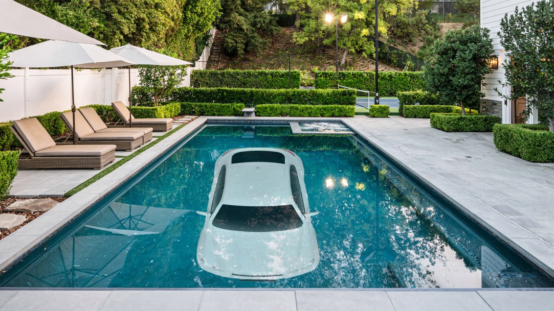 car-submerged-in-swimming-pool