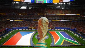 FIFA World Cup Trophy next to flags of Czech Republic v South Africa