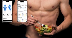 muscular man eating salad next to MacroFactor workouts app