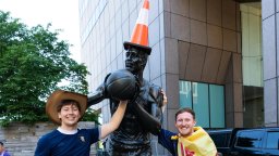 Why Are Scottish Soccer Fans Putting Traffic Cones Atop All The Statues In Boston?