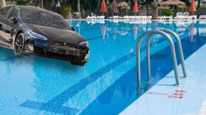 Tesla driving into swimming pool