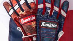 Franklin Just Dropped The Ultimate ‘USA 250’ Batting Gloves So MLB Players Can Flex Pure Freedom At The PlateAmerica is turning 250 in 2026. That is a quarter-millennium of bald eagles, backyard barbecues, and baseball. And because you simply cannot celebrate a milestone birthday without some absolute on-field drip, the crew over at Franklin Sports is stepping up to the plate to make sure the Big Leagues look spectacularly patriotic.  Franklin—who is also quietly celebrating their own massive 80th anniversary this year (not a bad run, fellas)—just unveiled their exclusive “USA 250” series batting gloves.  Starting this May, over 900 professional athletes are going to start debuting these beauties on-field, leading up to a massive, league-wide red-white-and-blue takeover for July 4th and the All-Star festivities.  But this isn’t some lazy, low-effort patch job.  These premium digital cabretta leather gloves feature a gorgeous split design—predominantly red on one hand (symbolizing courage and sacrifice) and navy on the other (representing resilience and unity).  But the absolute best detail? Franklin literally sublimated “Life, Liberty and the Pursuit of Happiness” right across the side flex and the knuckle bridge.  That means the next time your favorite slugger pimps a 450-foot moonshot, they are pointing the actual Declaration of Independence directly at the pitcher’s mound. If that isn’t a high-key patriotic flex, we don’t know what is.  If you want to channel your inner superstar while struggling to hit a beach-ball-sized pitch in your local Thursday night beer league, you’re in luck. Franklin is dropping the USA 250 series nationwide through retail partners like Dick’s Sporting Goods.  Grab a pair, crack open a cold one, and let’s get ready to party like it’s 1776.