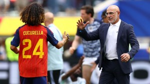 Spain defender Marc Cucurella embraces manager Luis De La Fuente at 2026 FIFA World Cup