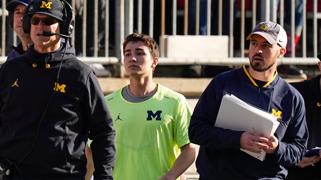 Michigan-Wolverines-head-coach-Jim-Harbaugh-with-Connor-Stalions