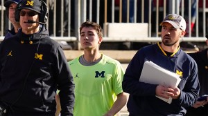 Michigan-Wolverines-head-coach-Jim-Harbaugh-with-Connor-Stalions