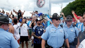 Police In Atlanta stop Argentina fans and England ffans from fighting each other