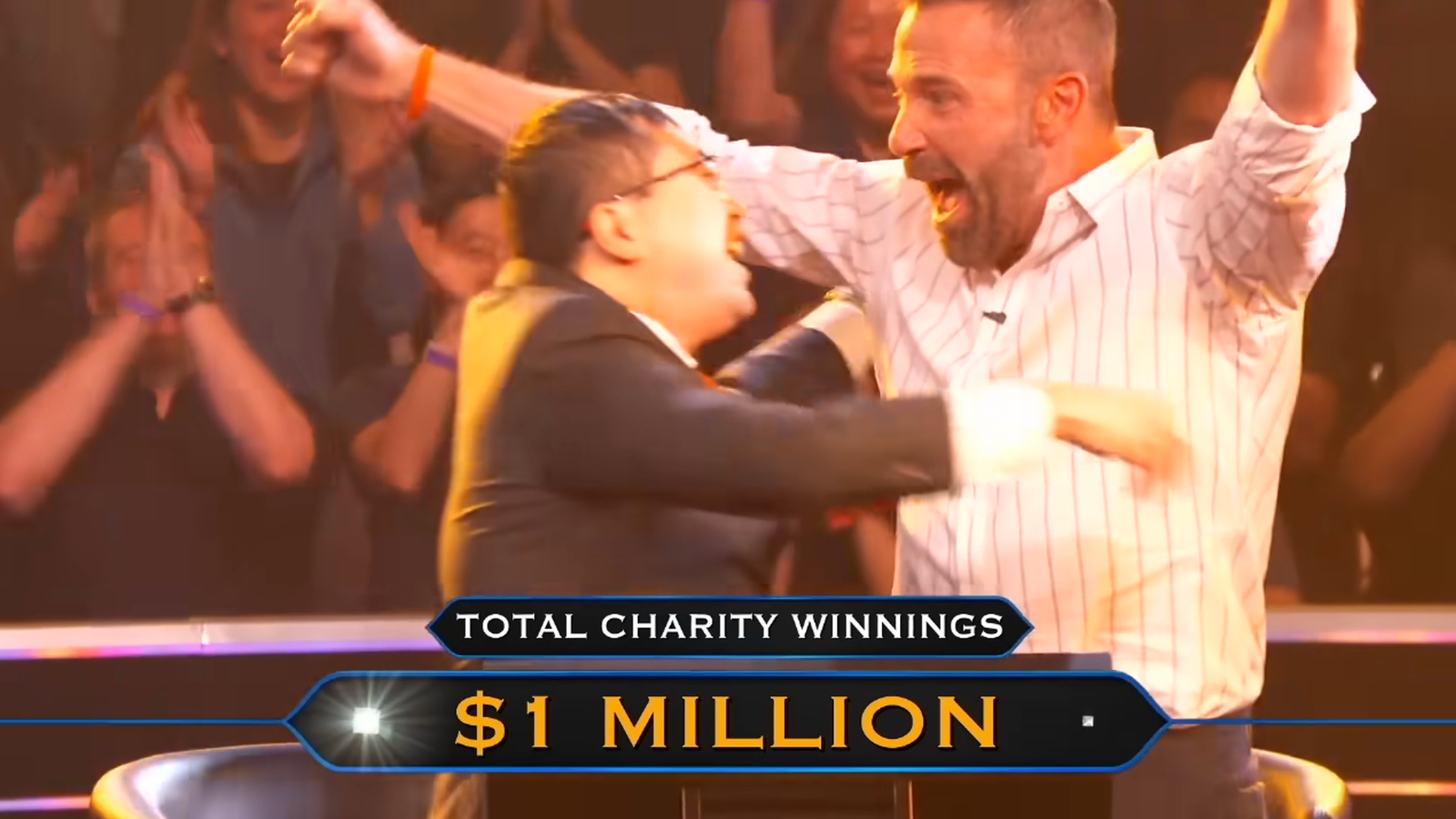 actor Ben Affleck celebrates winning Who Wants To Be A Millionaire