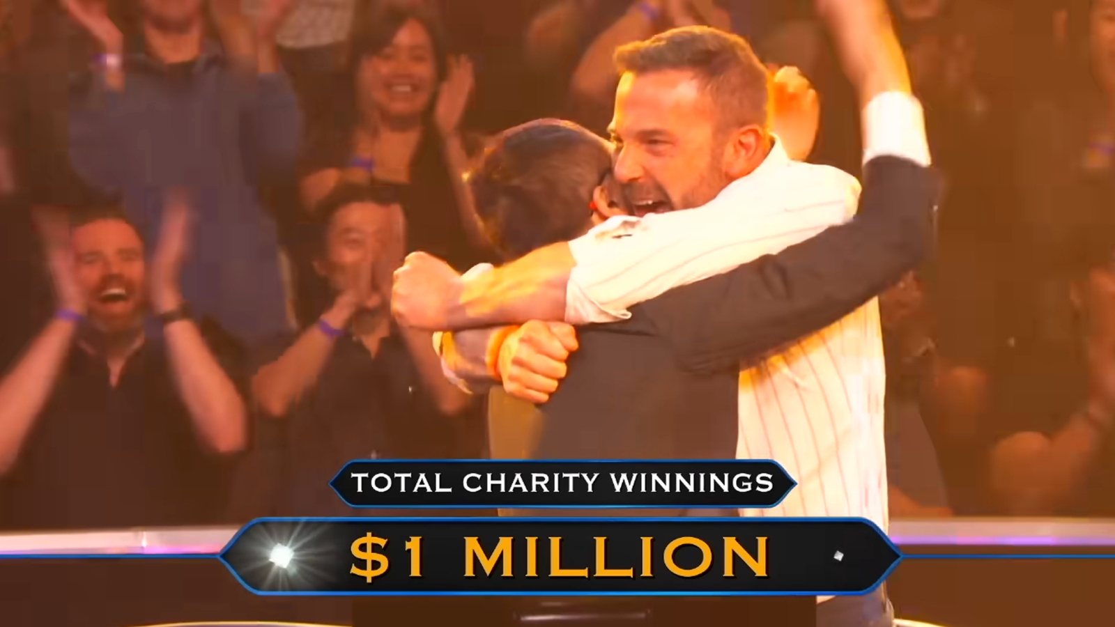 actor Ben Affleck celebrates winning Who Wants To Be A Millionaire