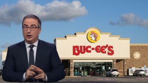 John Oliver next to a Buc-ee's sign