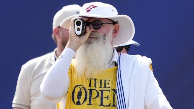 Lucas Herbert's caddie using rangefinder at British Open