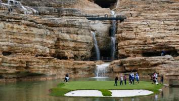 Golfers Lucky To Be Alive After Driving Cart Off Massive Cliff And Landing In Water Next To Iconic Hole At Missouri Course Designed By Tiger Woods (Video)