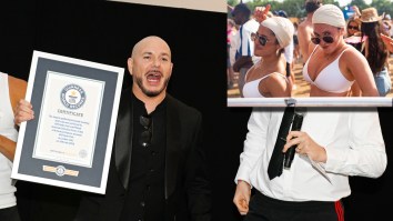 Pitbull Has Officially Become The Face Of Male Baldness After Setting World Record For Largest Gathering Of People Wearing Bald Caps
