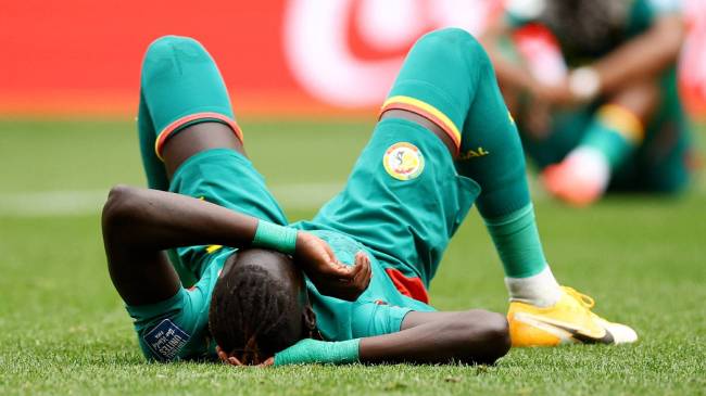 Senegal players after World Cup loss to Belgium