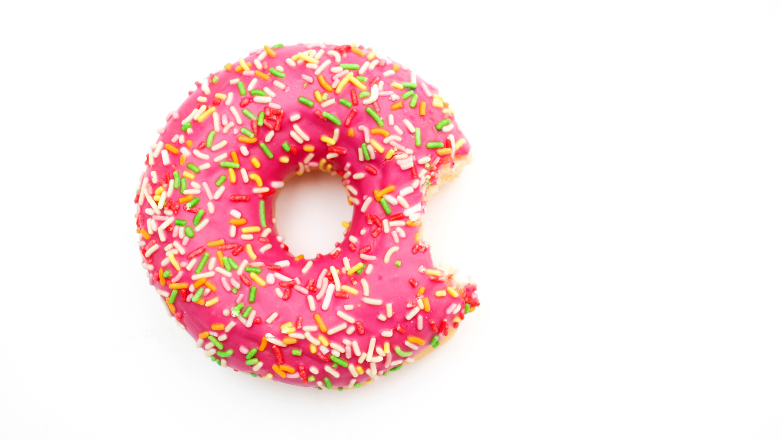 sprinkle donut with a bite missing