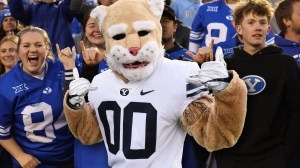 BYU mascot Cosmo in front of fans at a football game