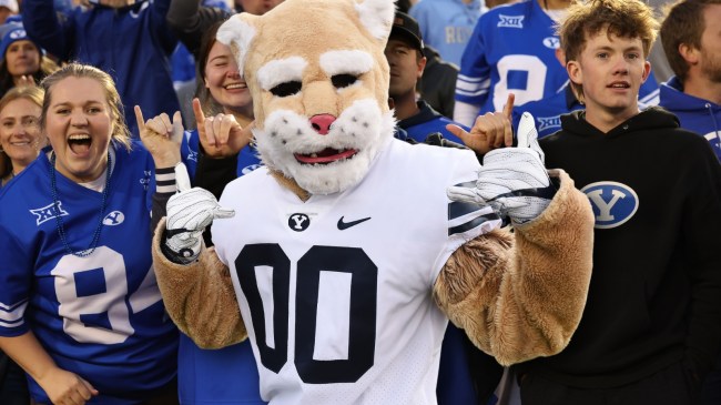 BYU mascot Cosmo in front of fans at a football game