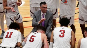 College basketball tampering Idaho State Saint Martin's Aaron Landon Expose