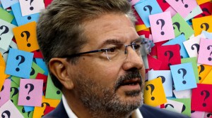Former Commanders owner Dan Snyder in front of question marks
