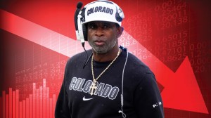 Deion Sanders over red downward arrow