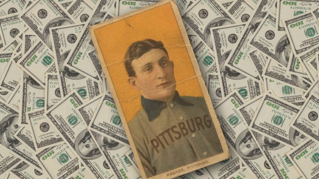 Honus Wagner baseball card over hundred dollar bills