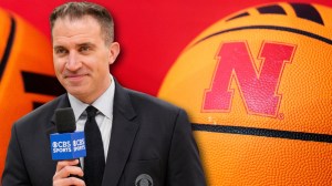 CBS Sports college basketball reporter Jon Rothstein next to basketball with Nebraska logo