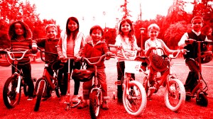 kids-on-bikes-in-grass