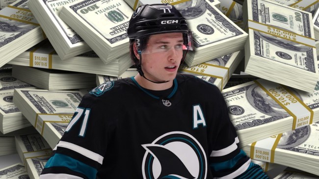 San Jose Sharks star Macklin Celebrini over stacks of hundred-dollar bills