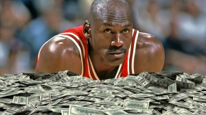 Michael Jordan over giant piles of hundred dollar bills