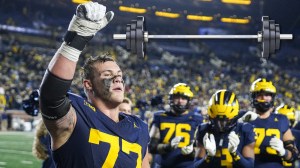 Michigan football bench press exercise strength training body transformation muscle
