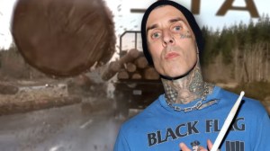 Blink-182 drummer Travis Barker next to log truck from Final Destination 2