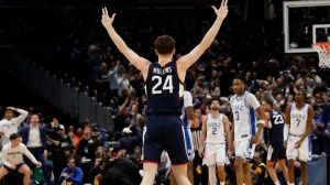 UConn guard Braylon Mullins celebrates after hitting game-winner to beat Duke