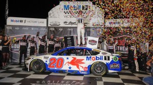 Christopher Bell celebrates in victory lane after NASCAR Cup Series race at Darlington.
