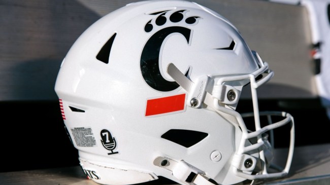Oct 18, 2025; Stillwater, Oklahoma, USA; Cincinnati Bearcats helmet sits on the bench prior to the game against the Oklahoma State Cowboys at Boone Pickens Stadium. 