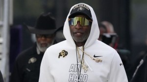 Sep 19, 2026; Evanston, Illinois, USA; Colorado Buffaloes head coach Deion Sanders takes the field with his team for warmups before the game against the Northwestern Wildcats at Northwestern Medicine Field at Martin Stadium.