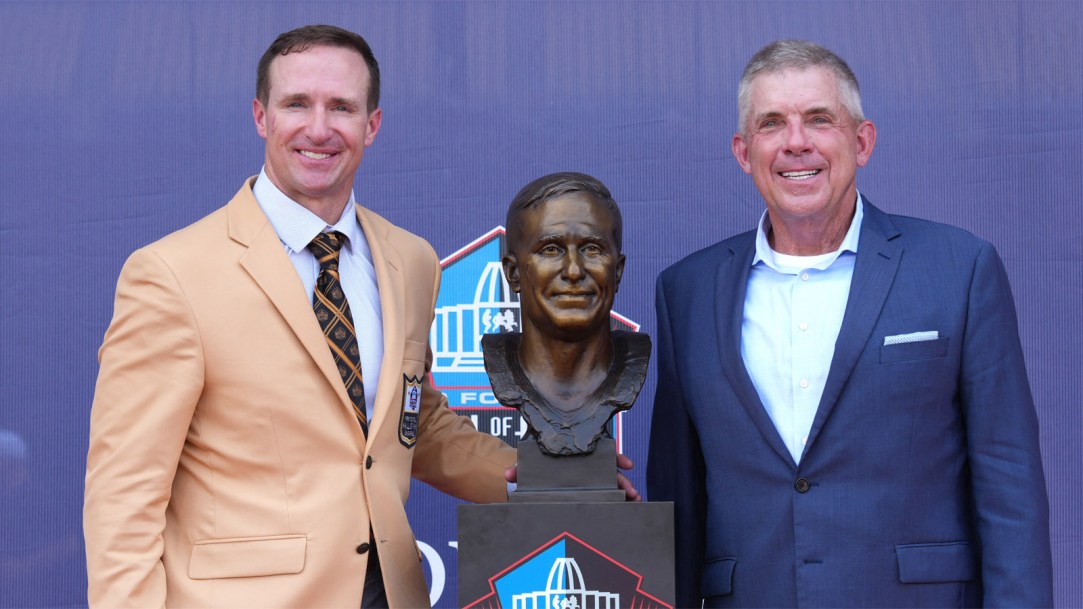 Drew-Brees-poses-with-his-Hall-of-Fame-bust-and-former-head-coach-Sean-Payton